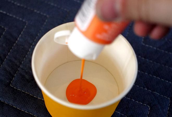 acrylic paint in the cup
