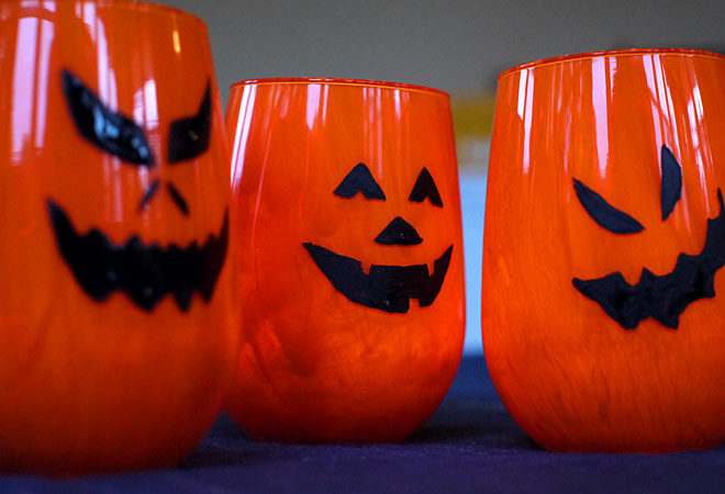 DIY painted Jack-O-Lantern candle holders