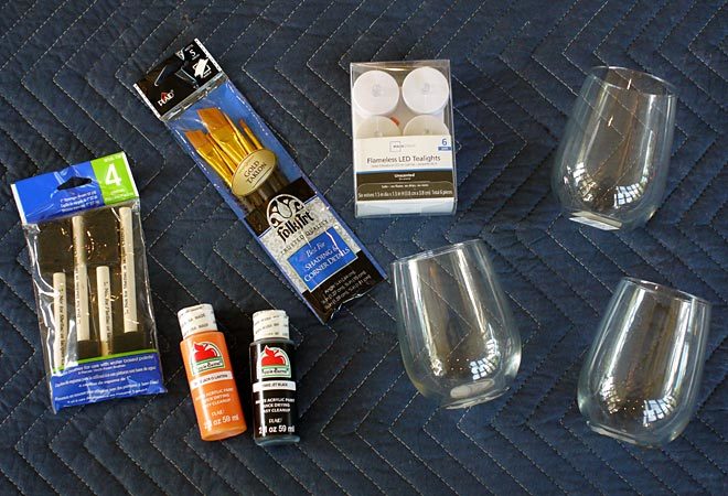 here are the supplies needed to make Jack-O-Lantern candle holders